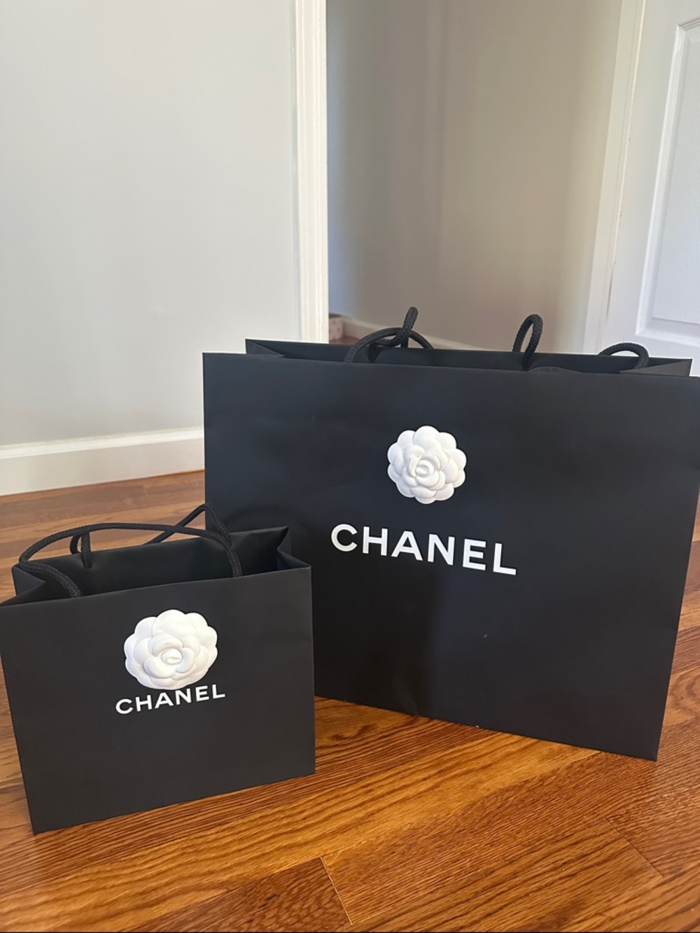 CHANEL Black Shopping Bags with White Camellia Logo - Pair
